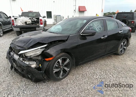 2016 Honda Civic Touring from USA, damaged, VIN 2HGFC1F94GH637445